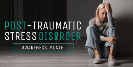 Depressed mature woman sitting in dark hall. Post-Traumatic Stress Disorder Awareness Month