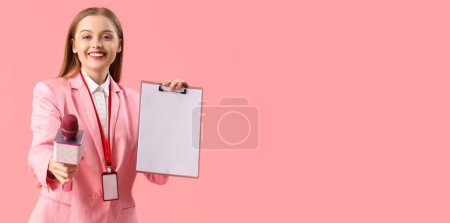 Female journalist with microphone and clipboard on pink background with space for text
