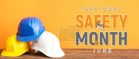 Banner for National Safety Month with hardhats