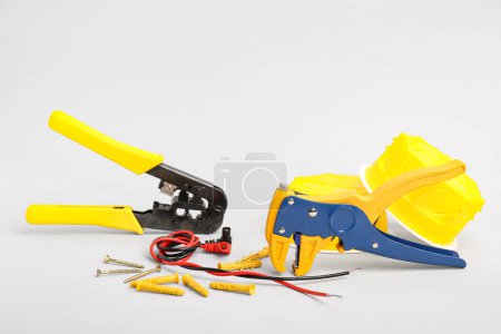 Photo for Set of different electrician's tools on light background - Royalty Free Image