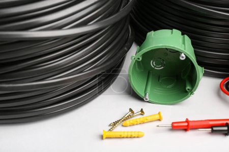 Photo for Set of electrician's tools on light background, closeup - Royalty Free Image