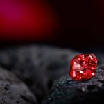 Red Diamond Gemstone  on Light Bokeh Background