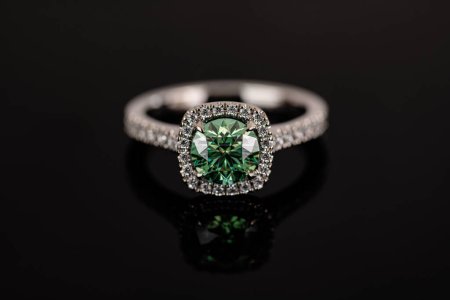 Photo for White gold luxury ring with precious blue green gemstone - Royalty Free Image