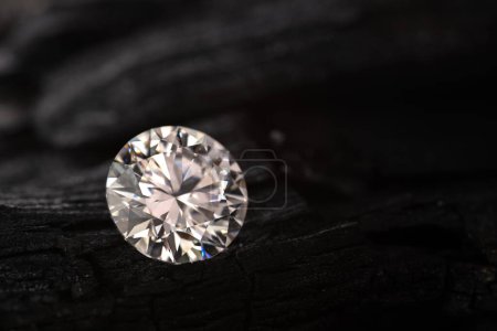 Photo for Diamond Gemstone on Black Coal - Royalty Free Image