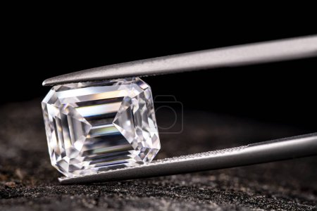 Photo for Diamond in Jewelry Tweezers Close up - Royalty Free Image