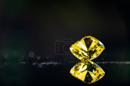 Photo for Yellow diamond on black background - Royalty Free Image