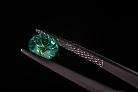 Photo for Precious Green Gemstone on Black Background - Royalty Free Image