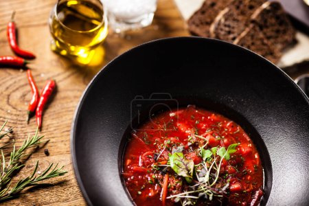 Photo for Beetroot soup Borscht with meat and sourcream served in restaurant - Royalty Free Image