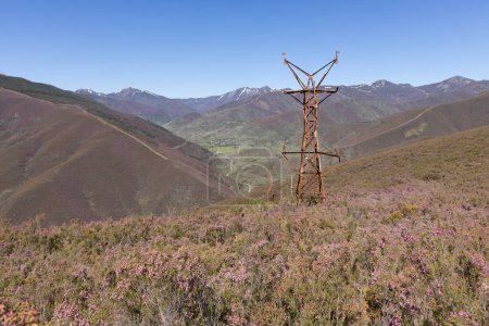 Photo for Abandoned metal tower structure in mountain landscape of Asturias Spain on a bright sunny day - Royalty Free Image