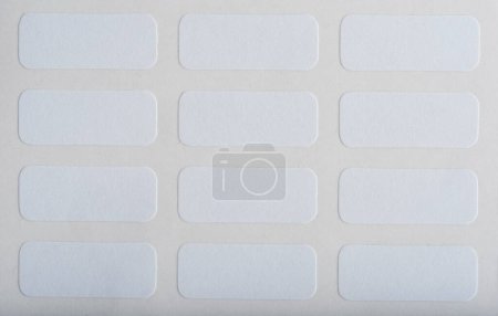 Téléchargez les photos : Autocollant blanc étiquette en papier isoler - en image libre de droit