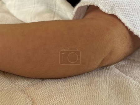 Photo for Newborn baby's hand in mother's hand, close-up - Royalty Free Image