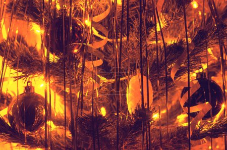Photo for Christmas tree with shining garland lights - Royalty Free Image
