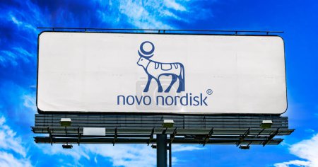 Photo for POZNAN, POL - OCT 28, 2022: Advertisement billboard displaying logo of Novo Nordisk, a multinational pharmaceutical company headquartered in Bagsvard, Denmark - Royalty Free Image