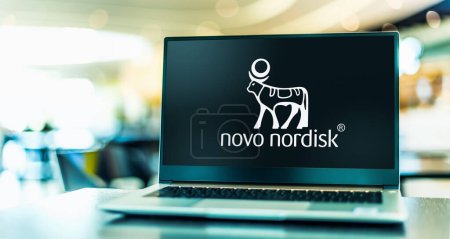 Photo for POZNAN, POL - OCT 28, 2022: Laptop computer displaying logo of Novo Nordisk, a multinational pharmaceutical company headquartered in Bagsvard, Denmark - Royalty Free Image