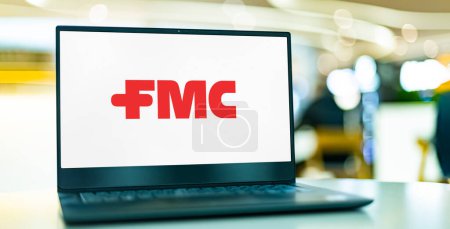 Photo for POZNAN, POL - DEC 28, 2022: Laptop computer displaying logo of FMC Corporation, a chemical manufacturing company based in Philadelphia, Pennsylvania - Royalty Free Image