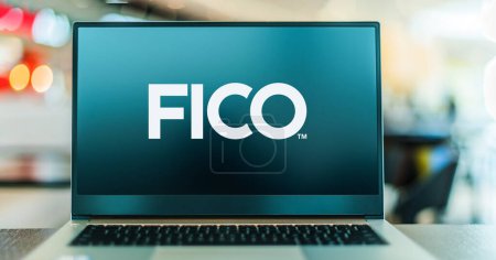 Photo for POZNAN, POL - MAY 4, 2022: Laptop computer displaying logo of FICO, a data analytics company based in San Jose, California, focused on credit scoring services - Royalty Free Image