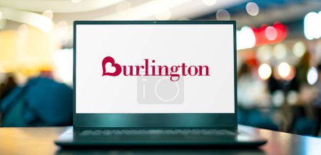Photo for POZNAN, POL - NOV 22, 2022: Laptop computer displaying logo of Burlington, a  national off-price department store retailer, and a division of Burlington Coat Factory Warehouse Corporation - Royalty Free Image