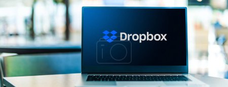 Photo for POZNAN, POL - SEP 23, 2020: Laptop computer displaying logo of Dropbox, a file hosting service operated by Dropbox, Inc., headquartered in San Francisco, California - Royalty Free Image