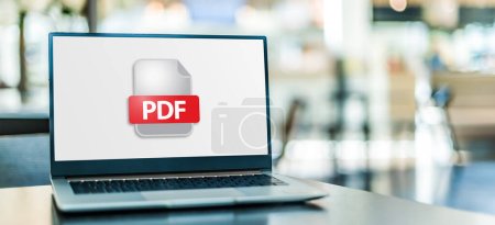 Téléchargez les photos : Ordinateur portable affichant l'icône du fichier PDF - en image libre de droit