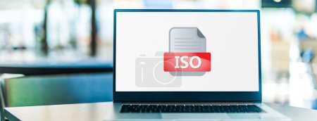 Photo for Laptop computer displaying the icon of iso file - Royalty Free Image