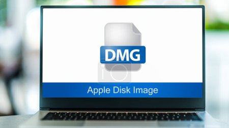 Photo for POZNAN, POL - JUL 12, 2023: Laptop computer displaying the icon of dmg file or Apple Disk Image - Royalty Free Image
