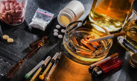 Photo for Addictive substances, including alcohol, cigarettes and drugs. - Royalty Free Image