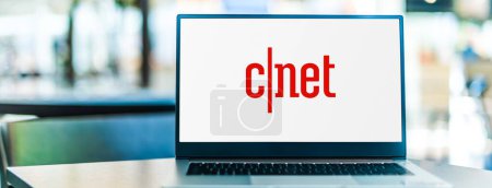 Photo for POZNAN, POL - JAN 6, 2021: Laptop computer displaying logo of CNET, an American media website that publishes reviews, news, articles, blogs, podcasts, and videos on technology and consumer electronics - Royalty Free Image