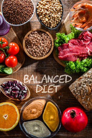 Photo for A variety of food products representing balanced diet - Royalty Free Image