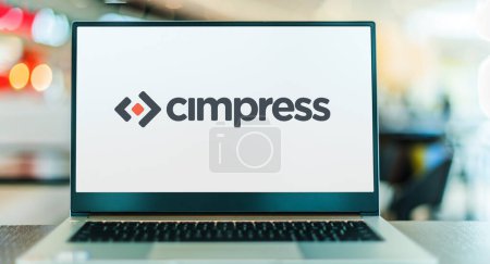 Téléchargez les photos : POZNAN, POL - DEC 28, 2022: Laptop computer displaying logo of Cimpress company - en image libre de droit