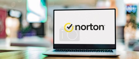 Photo for POZNAN, POL - APR 7, 2022: Laptop computer displaying logo of Norton AntiVirus, an anti-virus or anti-malware software product, developed and distributed by Symantec Corporation - Royalty Free Image