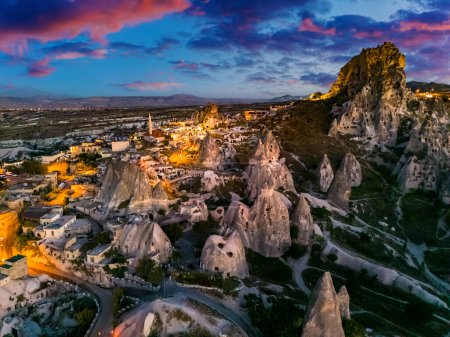Photo for View of Uchisar Castle in Nevsehir Province in Cappadocia, Turkey after sunset - Royalty Free Image