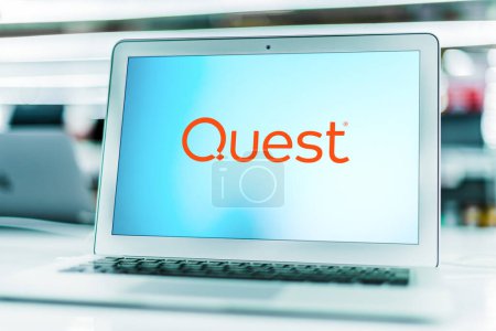 Photo for POZNAN, POL - MAR 15, 2021: Laptop computer displaying logo of Quest Software, a privately held software company headquartered in Aliso Viejo, California, US - Royalty Free Image