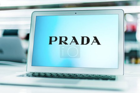 Photo for POZNAN, POL - MAY 15, 2021: Laptop computer displaying logo of Prada, an Italian luxury fashion house, specializing in leather handbags, travel accessories, shoes, ready-to-wear and perfumes - Royalty Free Image