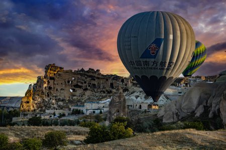 Photo for CAVUSIN, TUR - OCT 16, 2023: Hot air balloons near Cavusin in Goreme National Park in Cappadocia, Turkey. - Royalty Free Image