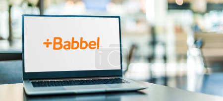 Photo for POZNAN, POL - NOV 28, 2023: Laptop computer displaying logo of Babbel, a German subscription-based language learning software and e-learning platform - Royalty Free Image