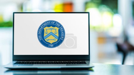 Photo for POZNAN, POL - DEC 5, 2023: Laptop computer displaying seal of The Department of the Treasury, the national treasury and finance department of the federal government of the USA - Royalty Free Image