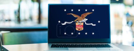 Photo for POZNAN, POL - DEC 5, 2023: Laptop computer displaying flag of The United States Department of Labor, one of the executive departments of the U.S. federal government - Royalty Free Image