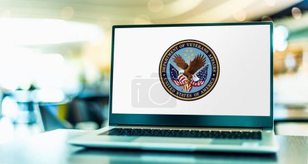 Photo for POZNAN, POL - DEC 5, 2023: Laptop computer displaying seal of The United States Department of Veterans Affairs, a Cabinet-level executive branch department of the federal government - Royalty Free Image