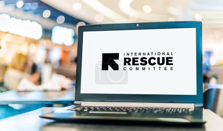 Photo for POZNAN, POL - DEC 5, 2023: Laptop computer displaying logo of The International Rescue Committee, a global humanitarian aid, relief, and development nongovernmental organization - Royalty Free Image