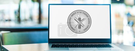 Photo for POZNAN, POL - DEC 5, 2023: Laptop computer displaying seal of the Administrative Office,  the administrative agency of the US federal court system - Royalty Free Image