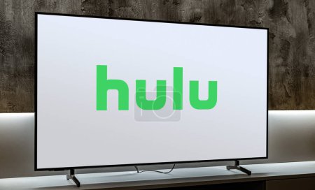 Photo for POZNAN, POL - DEC 19, 2023: Flat-screen TV set displaying logo of Hulu, a U.S.-based subscription video on demand service - Royalty Free Image