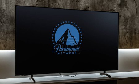 Photo for POZNAN, POL - DEC 19, 2023: Flat-screen TV set displaying logo of Paramount Network, an American basic cable television channel owned by the MTV Entertainment Group - Royalty Free Image