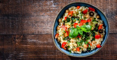 Photo for A plate of couscous served with vegetables and chickpeas - Royalty Free Image