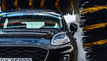 Photo for A vehicle in an automatic car wash. - Royalty Free Image