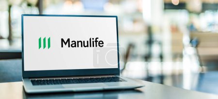 Photo for POZNAN, POL - JAN 23, 2024: Laptop computer displaying logo of Manulife Financial Corporation, a Canadian multinational insurance company and financial services provider - Royalty Free Image