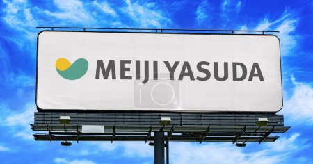 Foto de POZNAN, POL - 23 ENE 2024: Cartelera publicitaria que muestra el logotipo de Meiji Yasuda Life Insurance Company, una compañía de seguros de vida japonesa, con sede en Tokio - Imagen libre de derechos