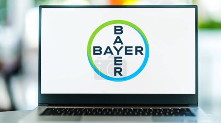 Téléchargez les photos : POZNAN, POL - DEC 28, 2022: Laptop computer displaying logo of Bayer AG, a German multinational pharmaceutical and biotechnology company - en image libre de droit