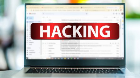 Téléchargez les photos : Laptop computer displaying the sign of hacking on an internet email site - en image libre de droit