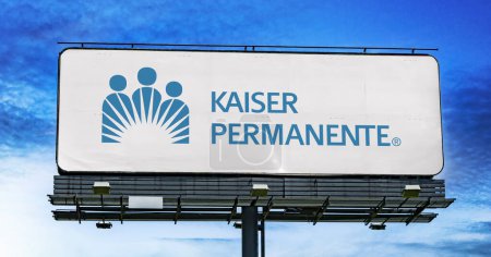Photo for POZNAN, POL - JAN 23, 2024: Advertisement billboard displaying logo of Kaiser Permanente, an integrated managed care consortium, based in Oakland, California, USA - Royalty Free Image
