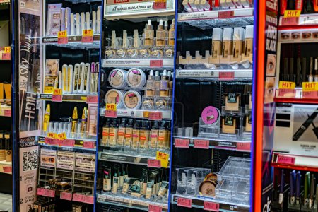 Photo for POZNAN, POL - JAN 12, 2024: Cosmetics and skincare products put up for sale in a beauty store - Royalty Free Image